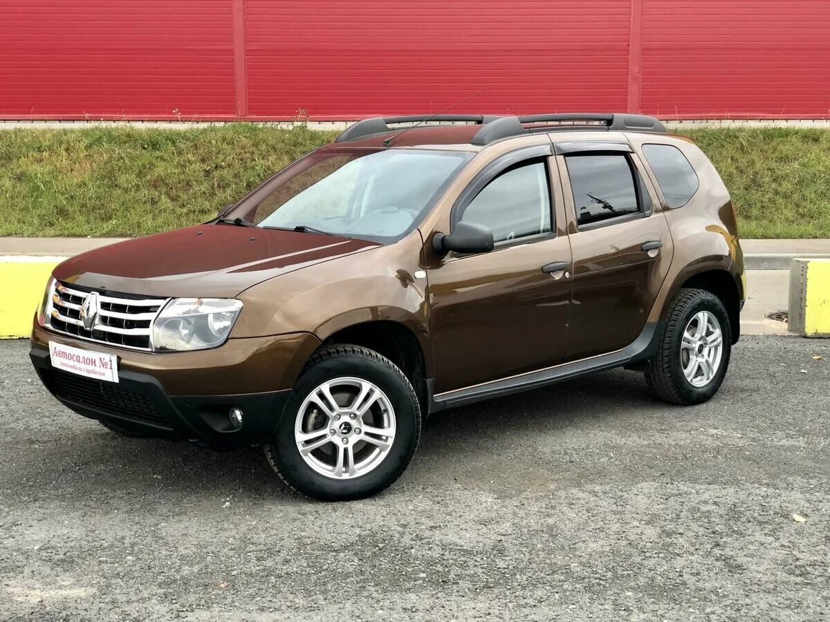 Рено дастер 2014 2.0 4х4. Рено Дастер 2014. Renault Duster 2014. Renault Duster коричневый. Рено Дастер 2013 года коричневый.