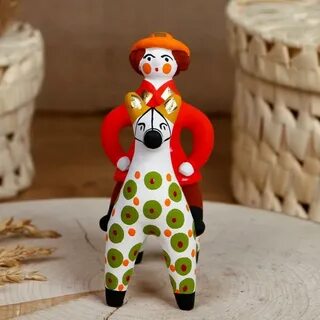 Глиняная игрушка дымковская