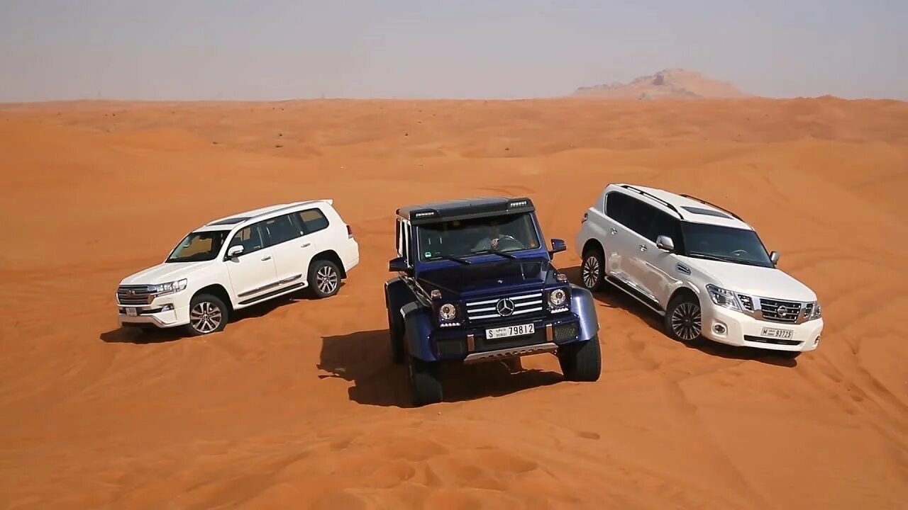 Ленд крузер танк 500. Toyota Land Cruiser 200 vs Mercedes g-class. Toyota Land Cruiser vs Mercedes Benz g-klasse. Nissan Patrol vs Toyota Land Cruiser. Ленд Крузер и ленд Ровер.