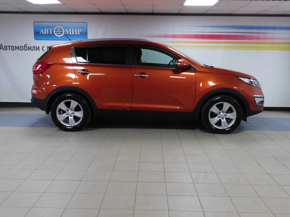 Куплю kia sportage б у. Orange Kia Sportage 3. Киа Спортейдж 3 оранжевый. Оранжевый кия Спортаж 3. Kia Sportage Orange 2010.