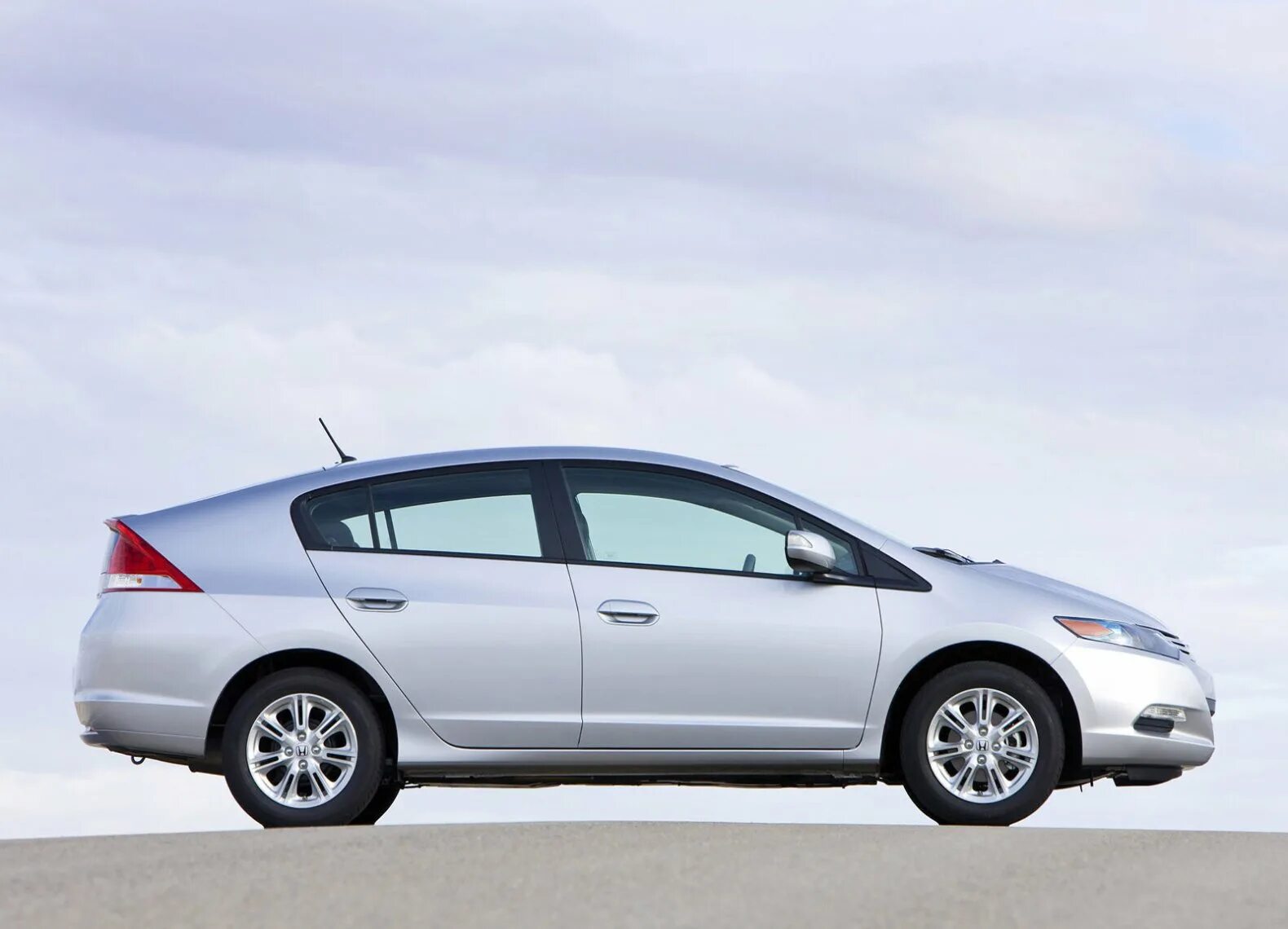 Honda insight ze2. Honda Insight 2010. Honda Insight II 2010. Honda Insight Hybrid 2010. Honda Insight 2009.