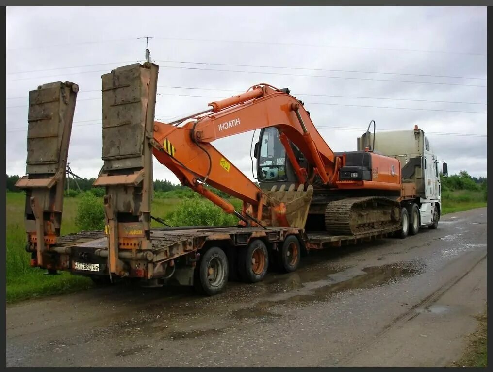 Хендай 290 на трале. Низкорамный трал негабарит. Экскаватор hyundai 170 на трале. Jcb 4cx на трале. Doosan 520 на трале.