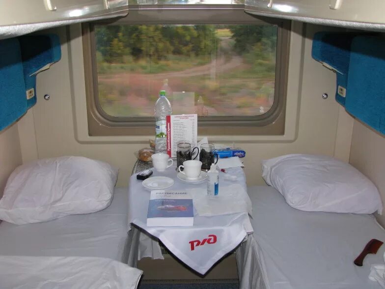 Поезд 2 москва владивосток. Купе люкс ржд. Поезд 002эа. Поезд москва владивосток. Поезд 002эа.