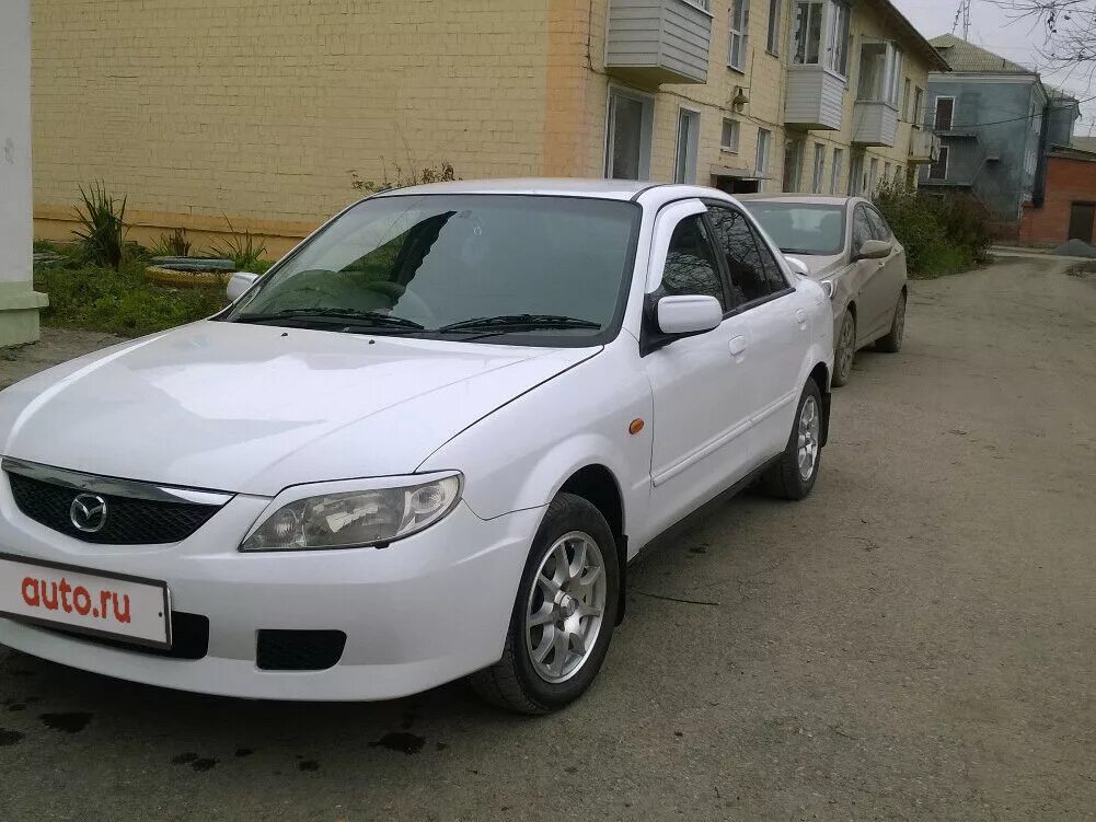 Mazda familia 2000 седан. Mazda familia 2000 в Рестайлинг. Мазда Фэмили 2001 седан. Mazda familia, 2000 - 2003 седан.