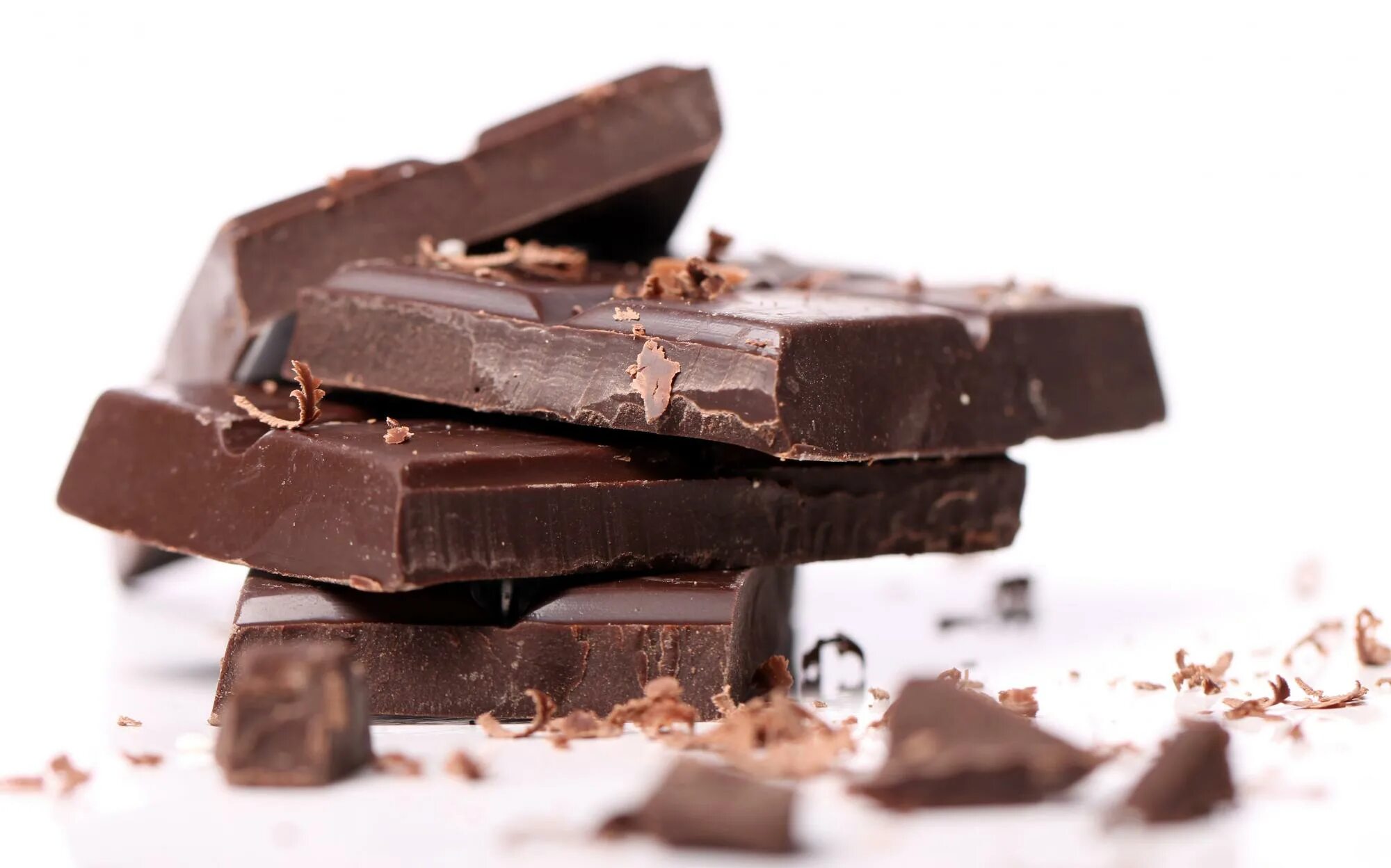 «dark chocolate», темный шоколад швейцария. Шоколад на белом фоне. Шоколад. Кусок шоколада. Темный шоколад.
