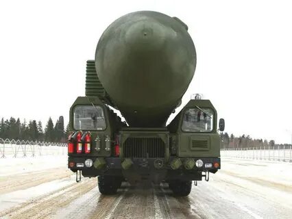 Вблизи м