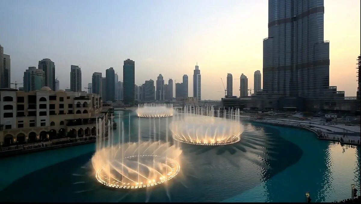 Прекрасные места 2020. Бурдж Халифа фонтаны. Поющие фонтаны Бурдж Халифа. Поющие фонтаны в Абу Даби. Фонтан Дубай Объединённые арабские эмираты.