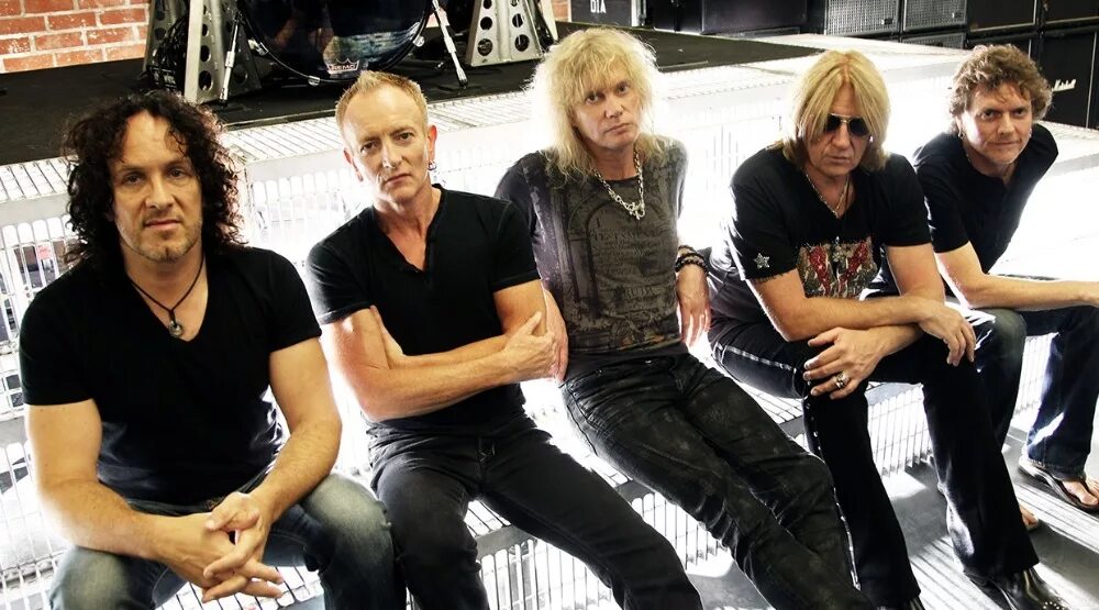 Def leppard 80е. Группа def leppard 2020. Def leppard drastic symphonies. Музыкальные группы 2023. Def leppard фото группы.