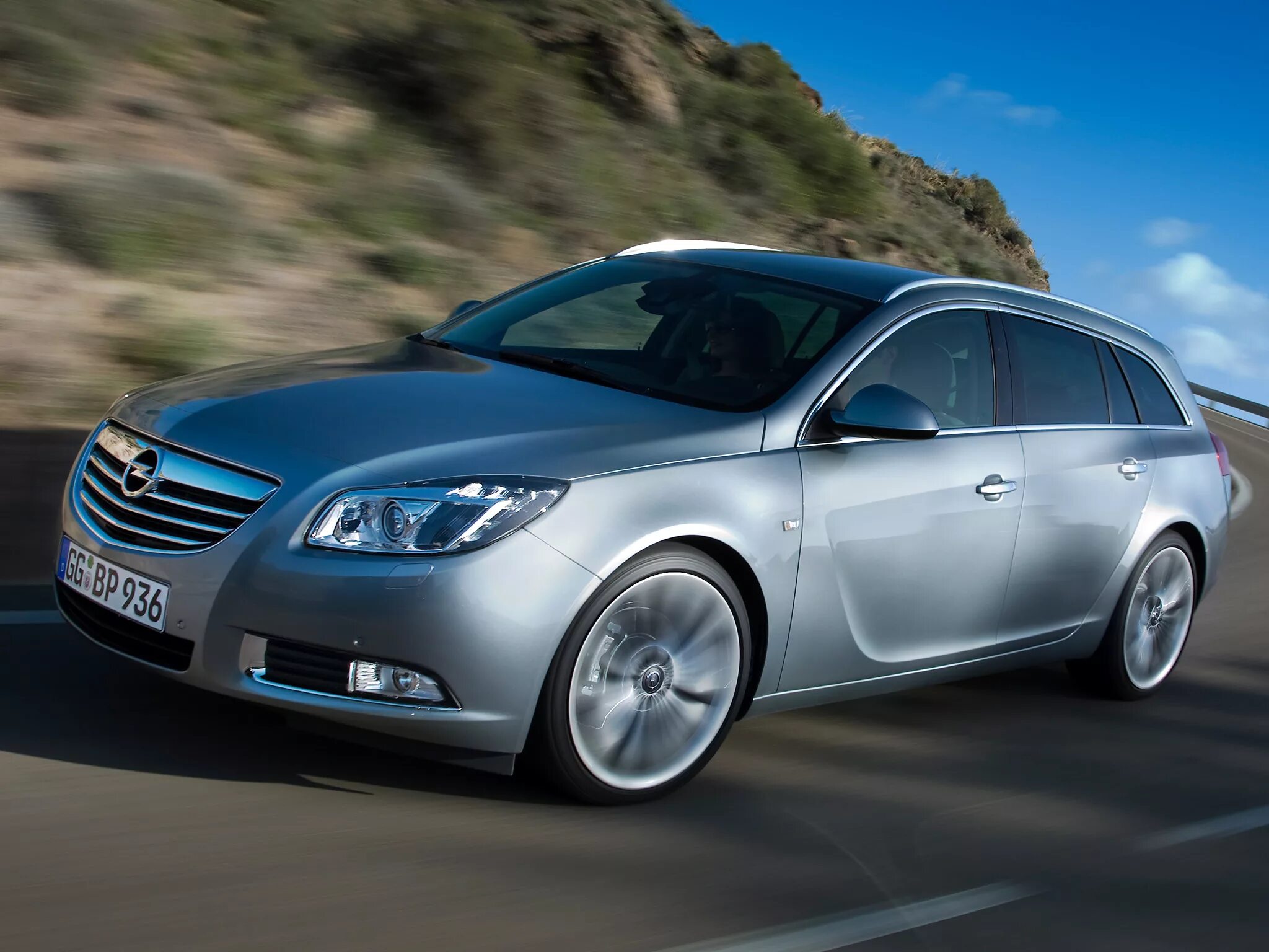 Opel insignia sport. Опель Инсигния 2.0 универсал. Опель Инсигния 2008 универсал. Opel Insignia 2012 универсал. Опель Инсигния универсал 2011.