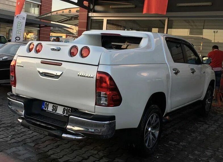 Тойота хайлюкс бу купить на авито. Toyota Hilux 2022 с кунгом. Кунг Toyota Hilux Revo. Hilux 2022 кунг. Тойота Хайлюкс 2017 с кунгом.