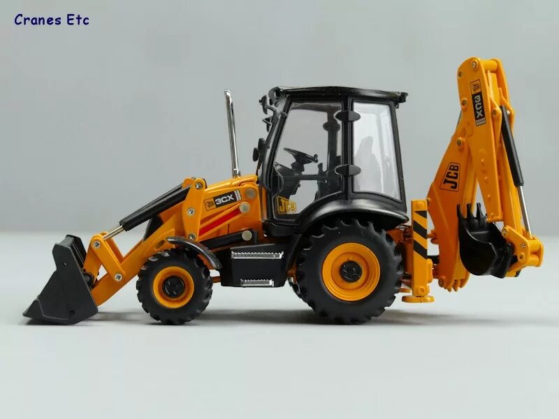 Модели jcb. Motorart 1:50 jcb 3cx. модель экскаватор jcb 3cx. масштабная модель jcb 3cx. jcb 3cx contractor.