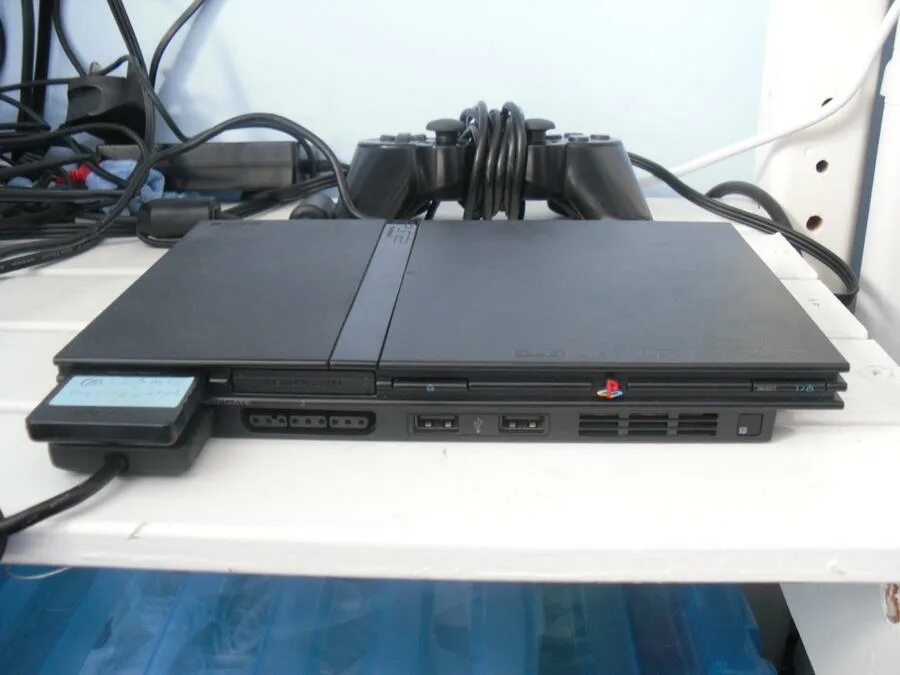 Sony playstation купить авито. Sony ps2 Slim. Sony PLAYSTATION 2 Slim. PLAYSTATION 2 Slim 7000. Sony PLAYSTATION 2 ps2.