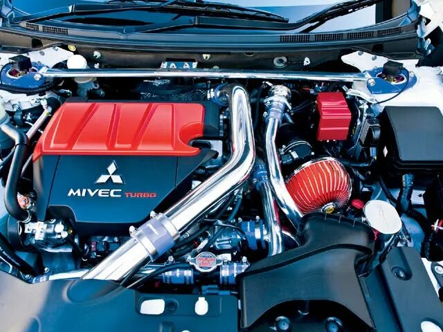 Лансер Эволюшн 10 мотор. Двигатель EVO 10. Mitsubishi Lancer Evolution 10 двигатель. Мицубиси Лансер 10 Эволюшн двигатель.