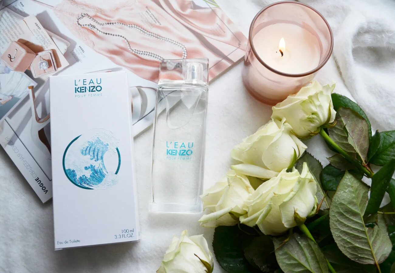 L eau de kenzo. Духи Кензо женские в белом флаконе. Кензо парфюмерный крем. Кензо с цветком на флаконе. Аромат женский Кензо запах свежести.