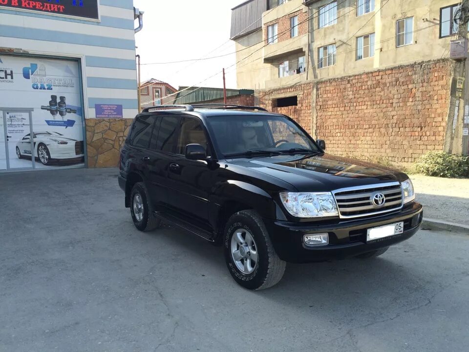 Тойота ленд крузер 100 черный 2007. Toyota land cruiser 100. Тойота ленд крузер 100 черный. Крузер 100 4,2 дизель. Тойота ленд крузер 100 тонированный.