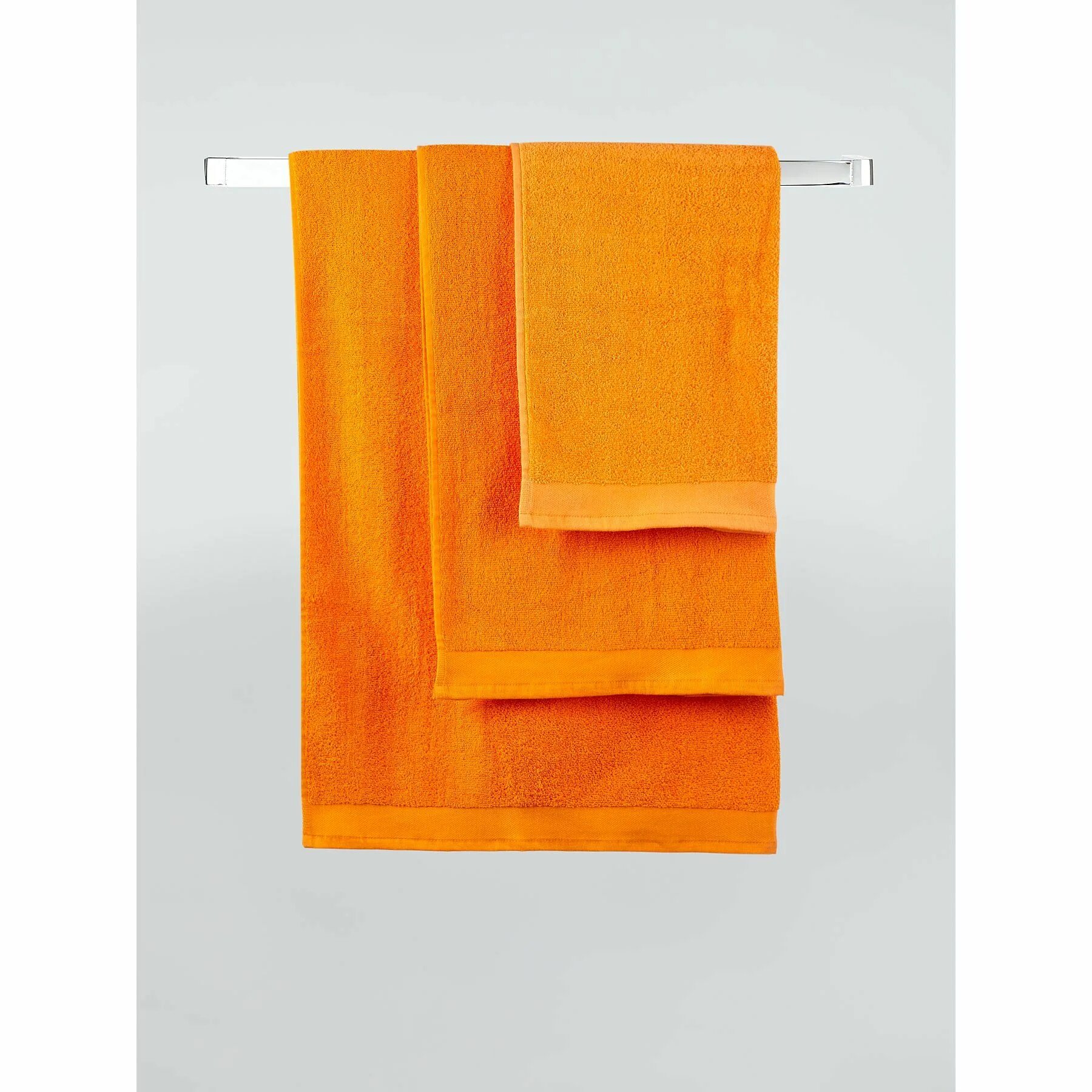 Оранжевое полотенце. Оранжевый полотенце для стола. Размер полотенца Bath Sheet. Полотенце Udo.