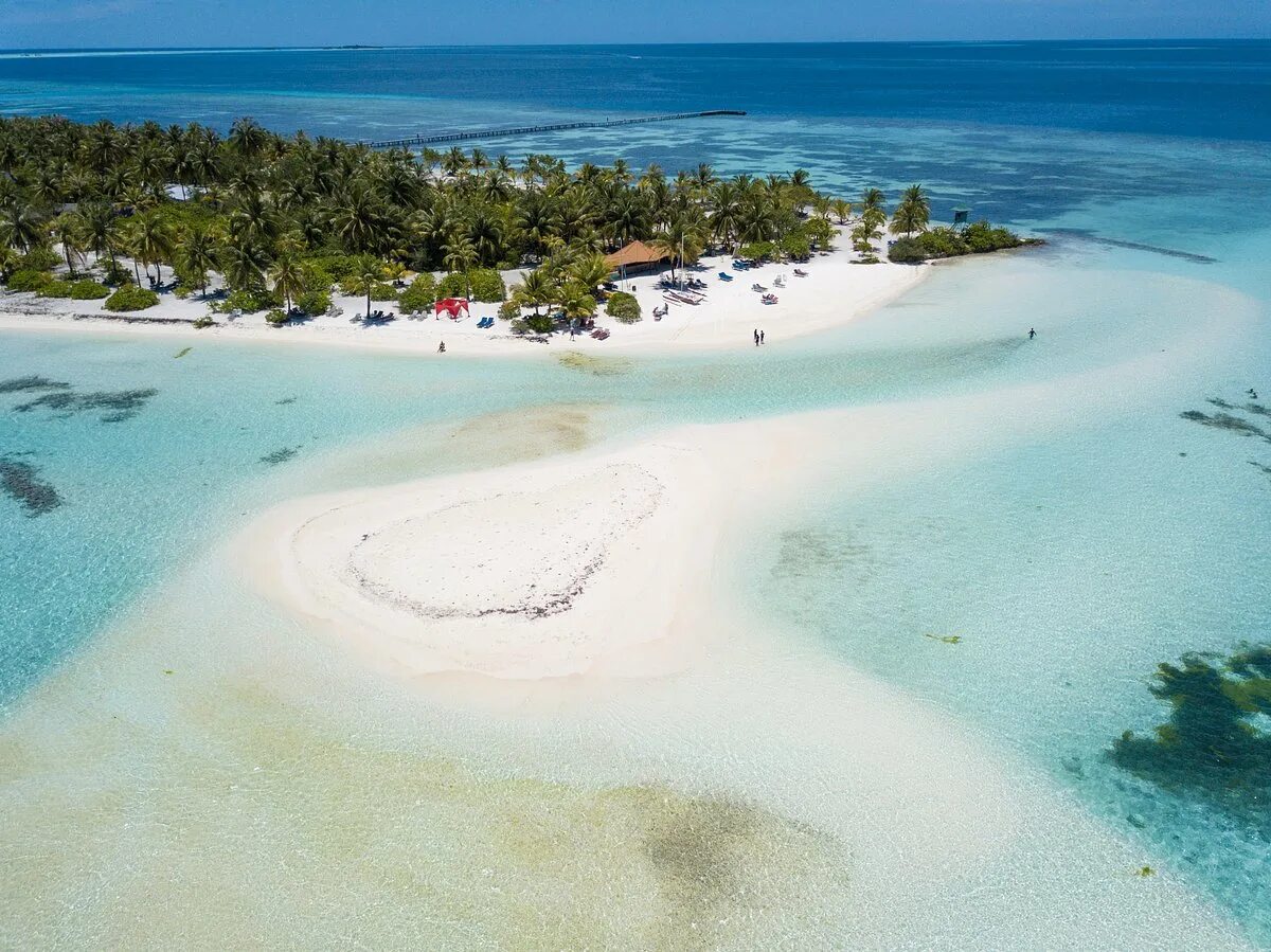 Fun island. Остров Фихалхохи Мальдивы. Остров Олувели Мальдивы. Мальдивы остров Сан Айленд. Fihalhohi Island Resort.