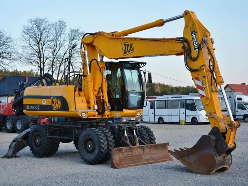 Jcb js200. Экскаватор jcb js160w. колесный экскаватор jcb js200w. jcb 200 колесный. колесный экскаватор jcb 205.