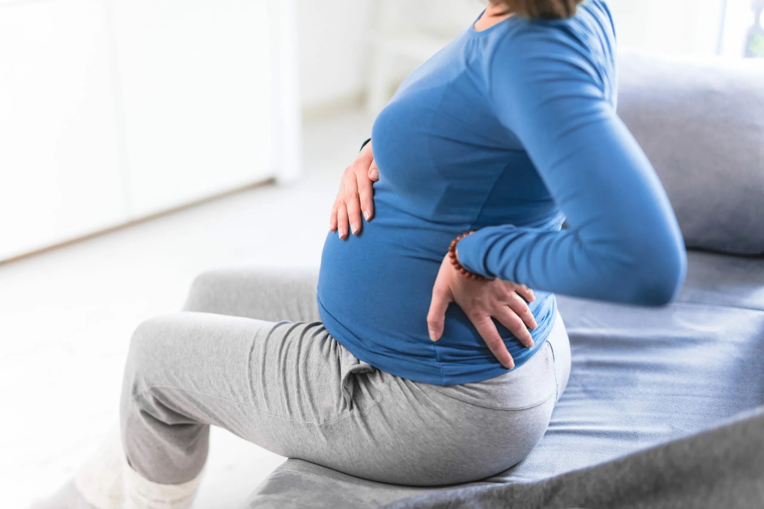 Болит поясница беременность 39. Боль в спине при беременности.