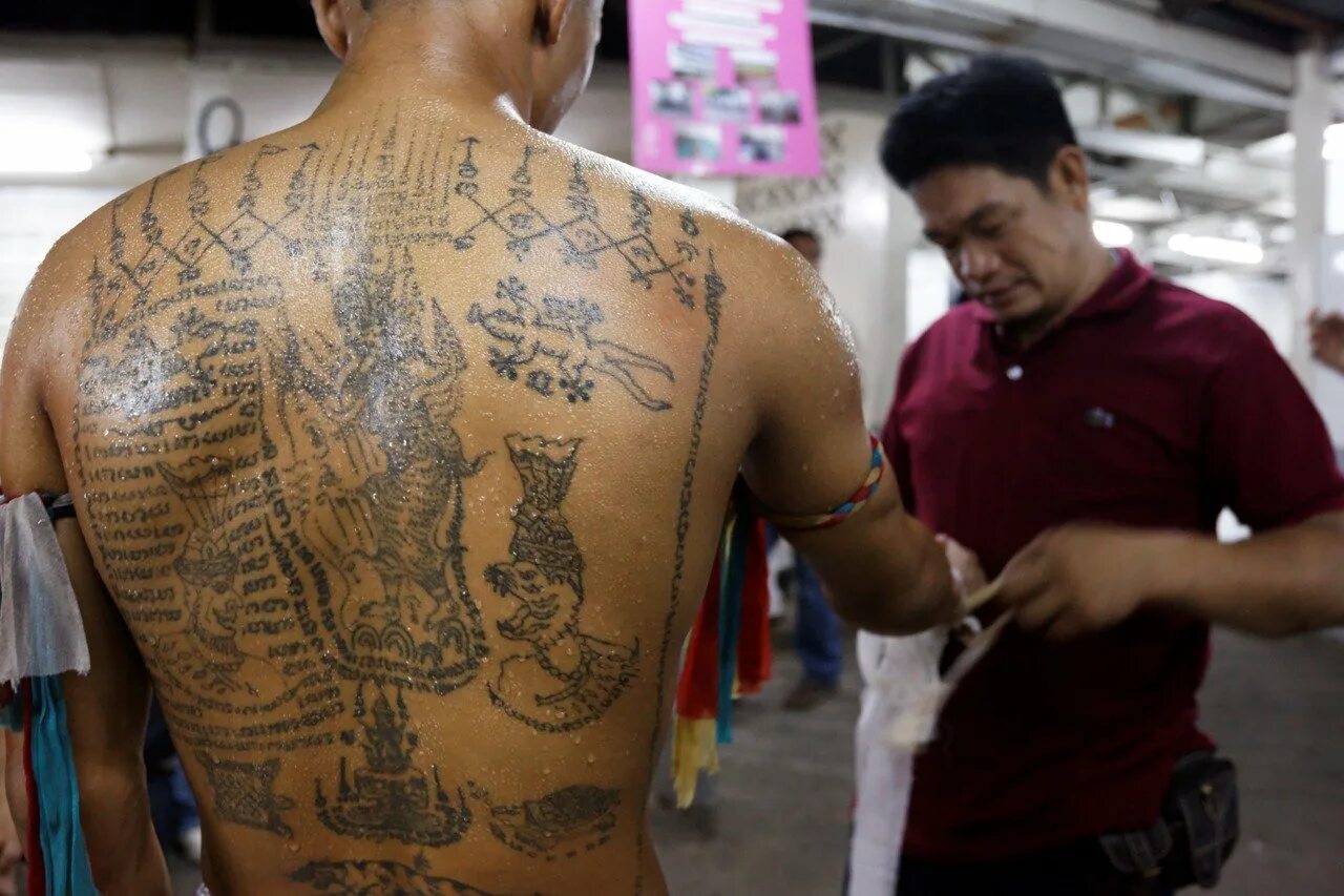 татуировки тайский бокс. тату тайских боксеров. сак янт муай тай. тата таю. боец муай тай тату.