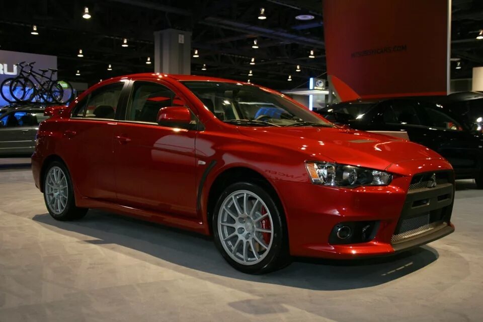 Митсубиши лансер 9 поколения. Мицубиси лансер эволюшн 9. Mitsubishi evo 7. Lancer evo 8. Митсубиси лансер 6.