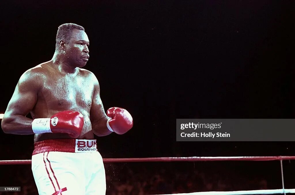 Майк тайсон ларри холмс бой. Майк тайсон 1989. Майк тайсон ларри холмс. Ларри холмс бой. Holmes боксер.