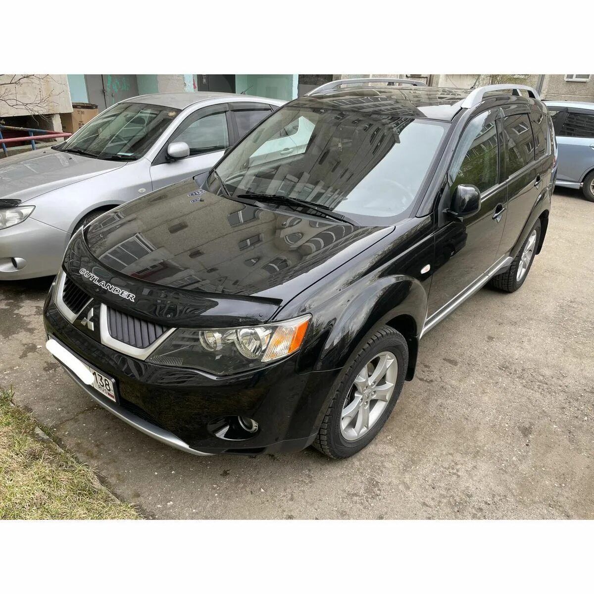 Купить мицубиси в иркутске. X42a цвет Мицубиси Аутлендер. Mitsubishi Outlander 2008 год чёрного цвета антихром тонированный. Аутлендер 2 литровый. Цвет х42 Митсубиси.