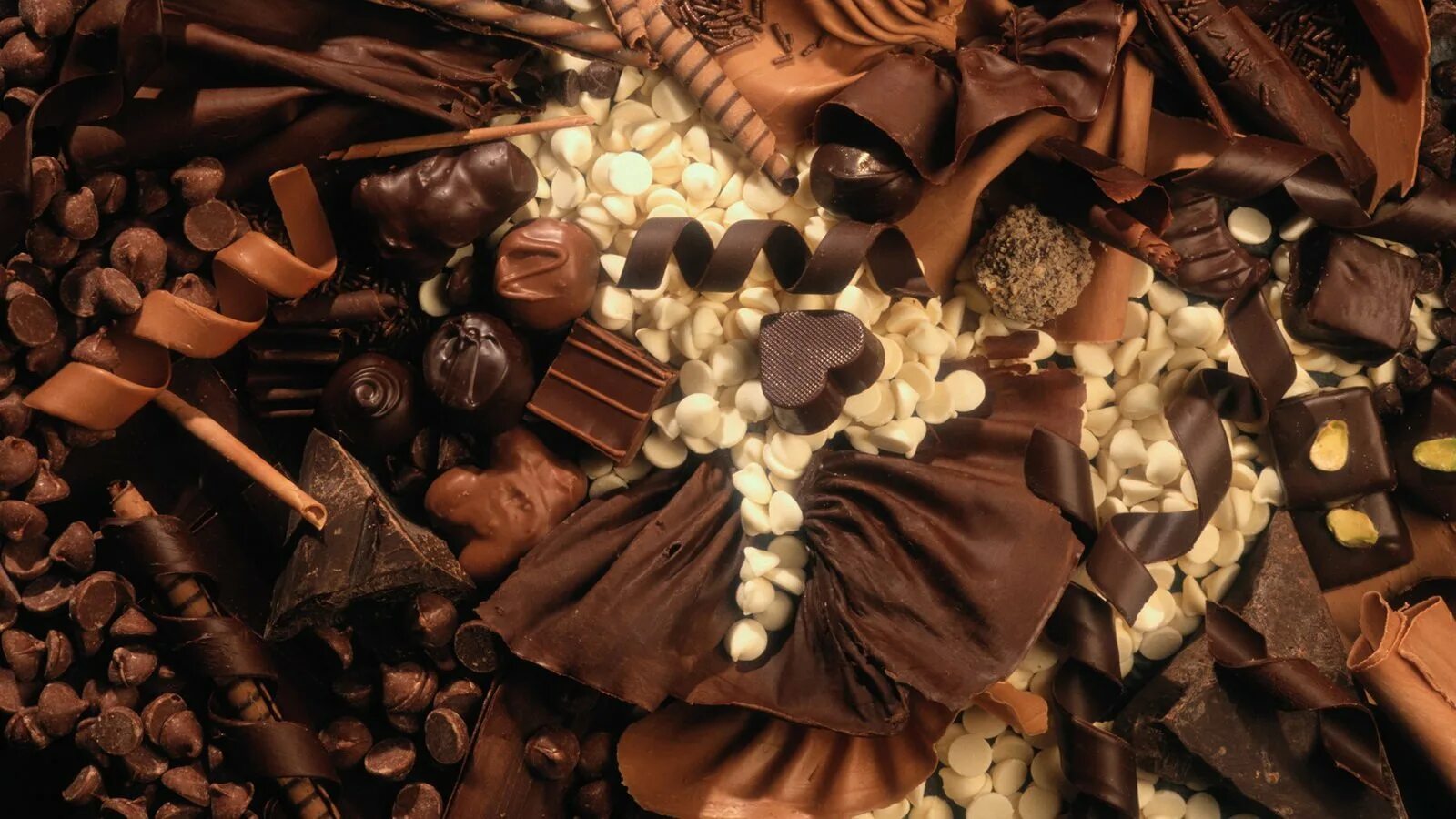 Сад шоколада. Шоколадные конфеты. Шоколадные конфеты Эстетика. Шоколадные конфеты Эстика. Обои на рабочий стол шоколад.