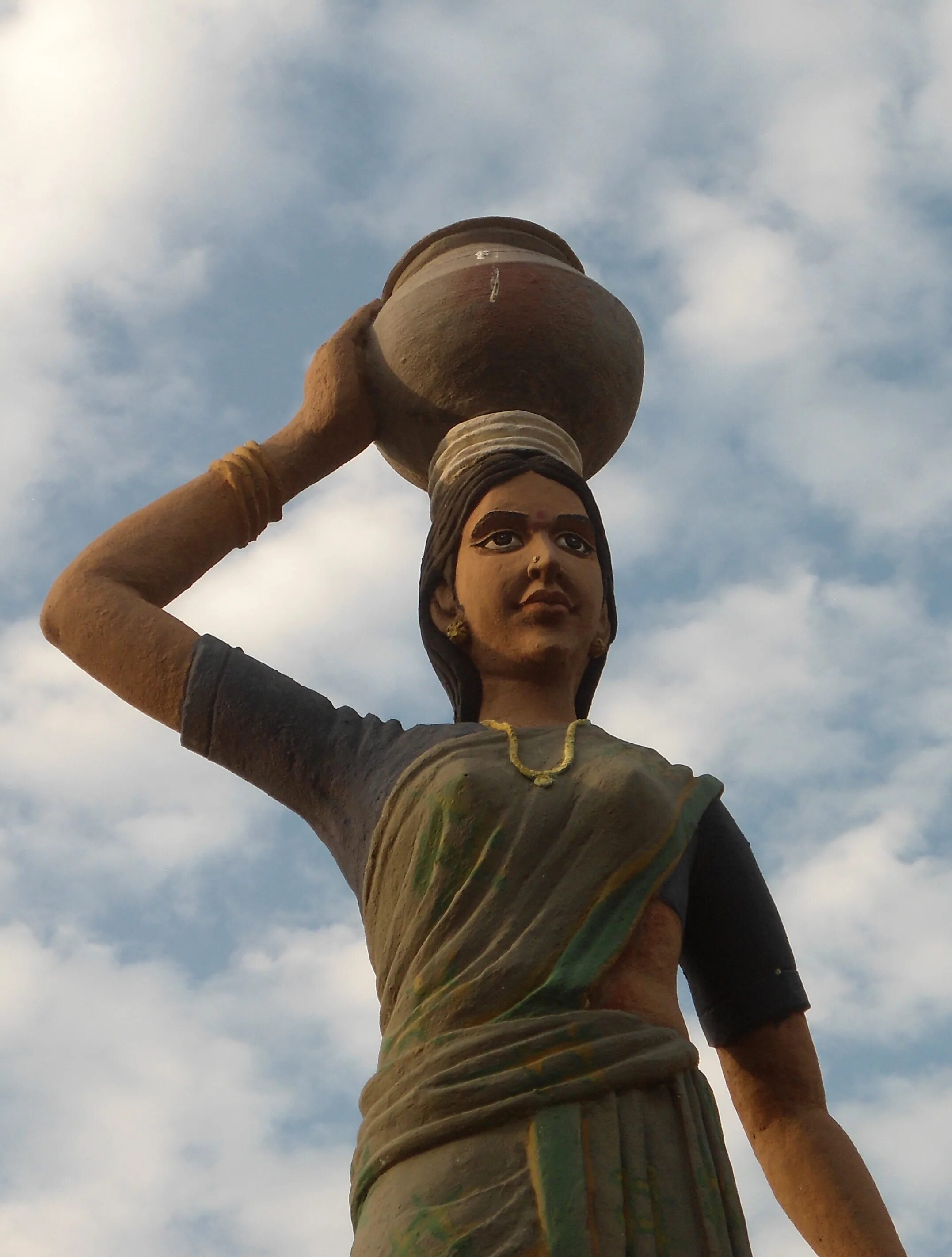 Женщина села на голову. Shilparamam Jathara. Women carring a Water in Bucket vector. Women carring a Water in Bucket rural place vector. A girl carrying Water.