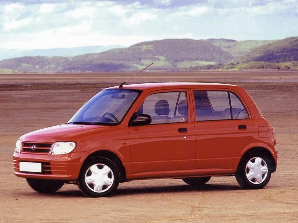 Daihatsu cuore l700 5 дверей. Дайхатсу cuore 1998. Дайхатсу Куоре 2004. Дайхатсу Куоре 1999. Daihatsu cuore