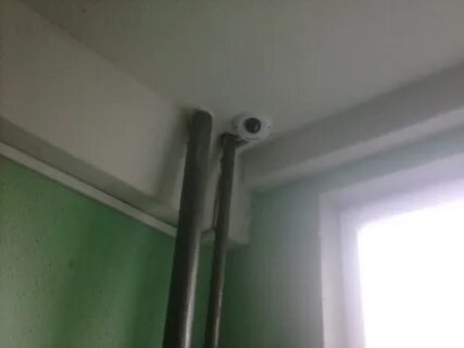 Камера над дверью