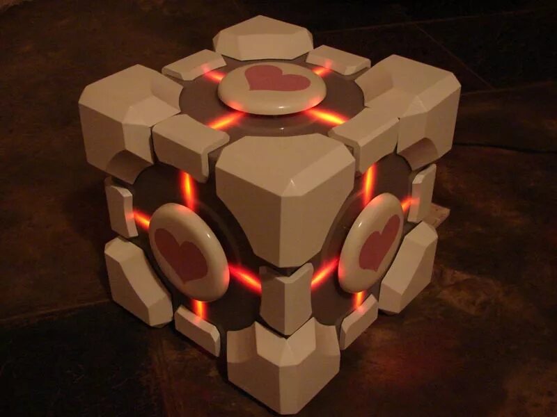 Portal cube. Куб компаньон из Portal 2. Куб портал 2. Кубы компаньоны портал 2. Кубик из Portal 2.