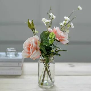 The vase is on the table