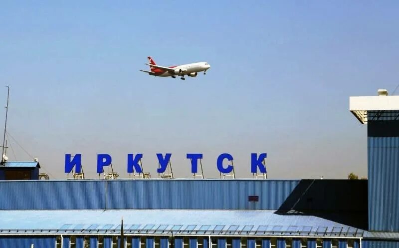 Самолет москва иркутск. Эмблема международного аэропорта иркутск. аэропорт иркутск 2 восточный. благовещенск иркутск самолет. полет из москвы в иркутск.
