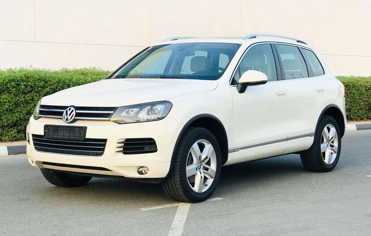 Volkswagen touareg 2012. Фольксваген Туарег 2012. Volkswagen Touareg 2012 белый. Туарег 2 2012. Volkswagen Touareg 2012 года.