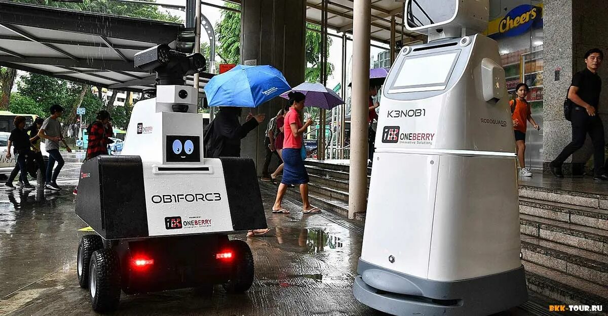 Роботы для обеспечения безопасности. Робот полицейский в Сингапуре. Робот полицейский робот охранник. Роботы в Сингапуре.