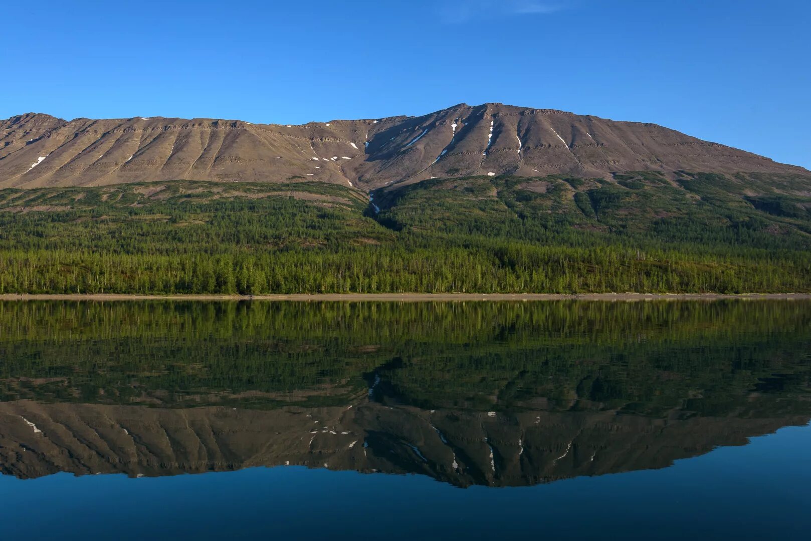 Заповедник Путорана Красноярский край. Плато Путорана горы. Гора камень на плато Путорана. Среднесибирское плато Путорана. Среднесибирское плоскогорье леса