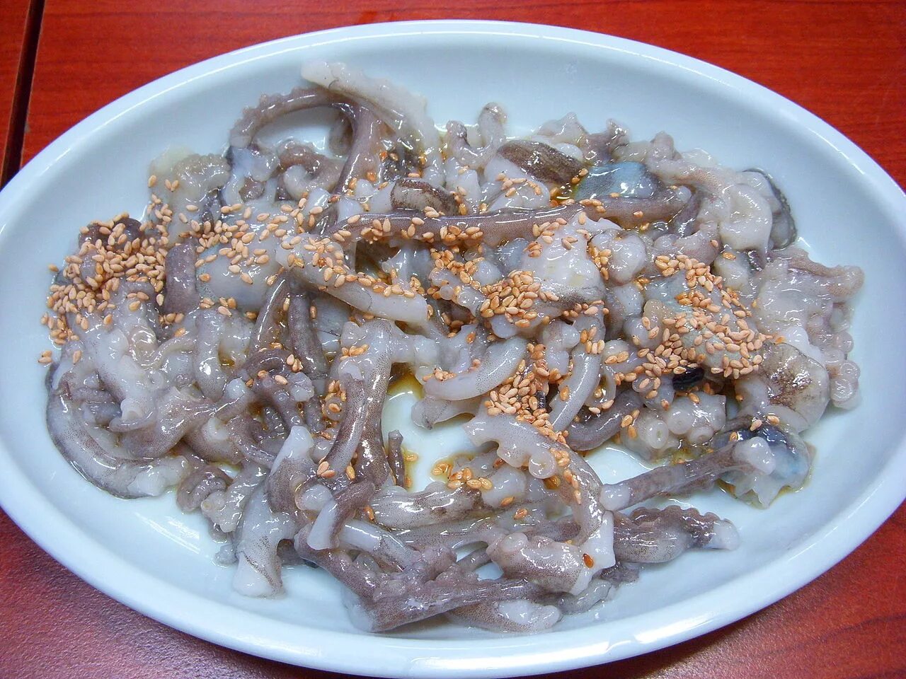 Мясо невкусное. Саннакчи живой осьминог Корея. Саннакчи блюдо корейское. Блюда из осьминога. Корейское блюдо с осьминогом.