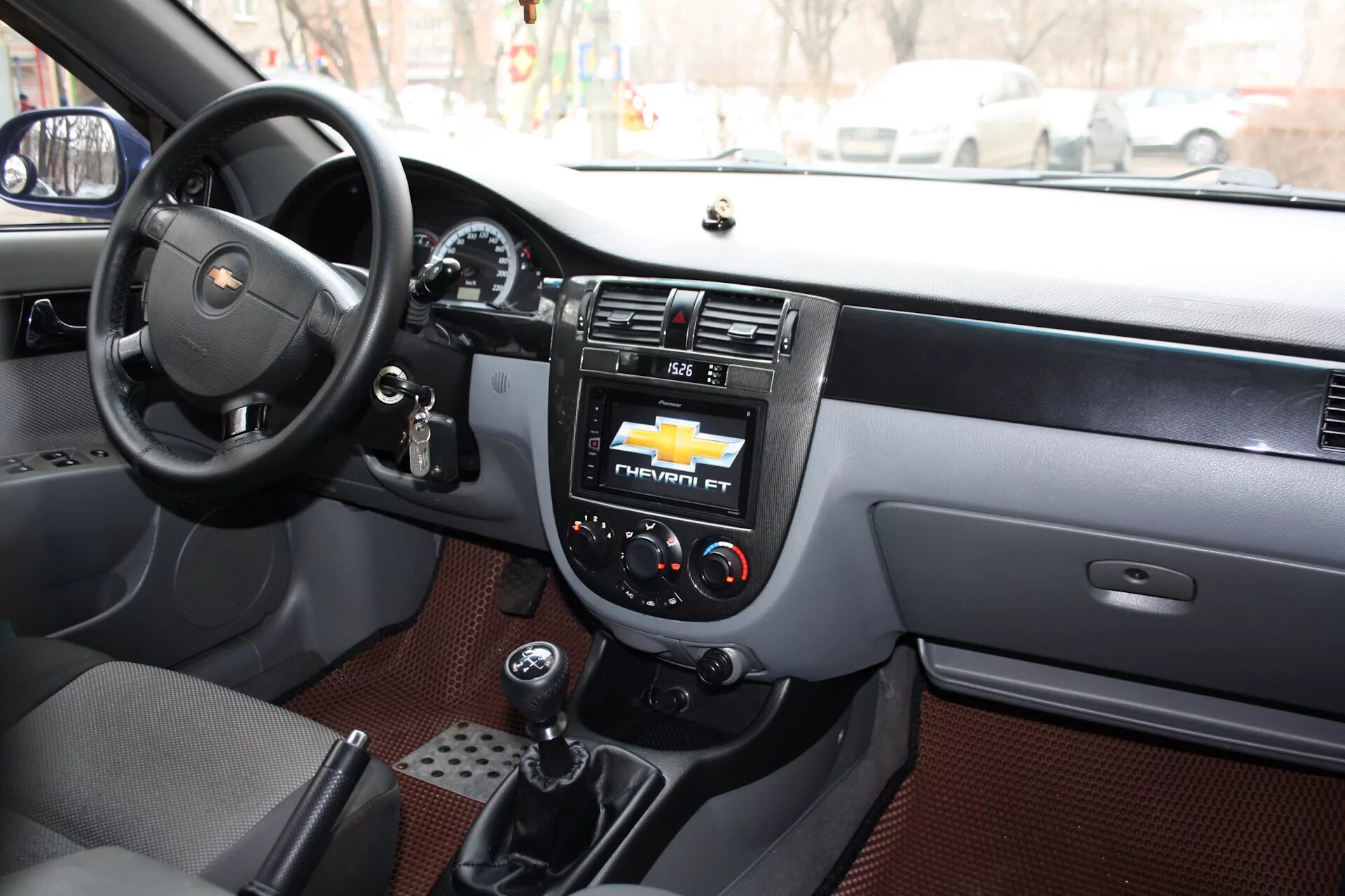 Панель лачетти универсал. Лачетти седан 2008 салон. Chevrolet Lacetti 2007 седан салон. Chevrolet Lacetti 2007 салон. Шевроле Лачетти седан 1.4 салон.