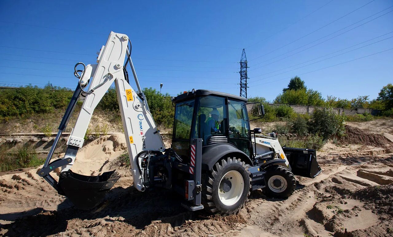 Экскаватор погрузчик Терекс 825. Экскаватор погрузчик - Terex TLB. TLB 825-RM экскаватор-погрузчик. Экскаватор-погрузчик UMG TLB 825. Экскаватор погрузчик umg