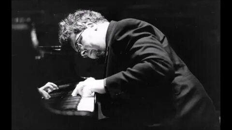 John playing the piano