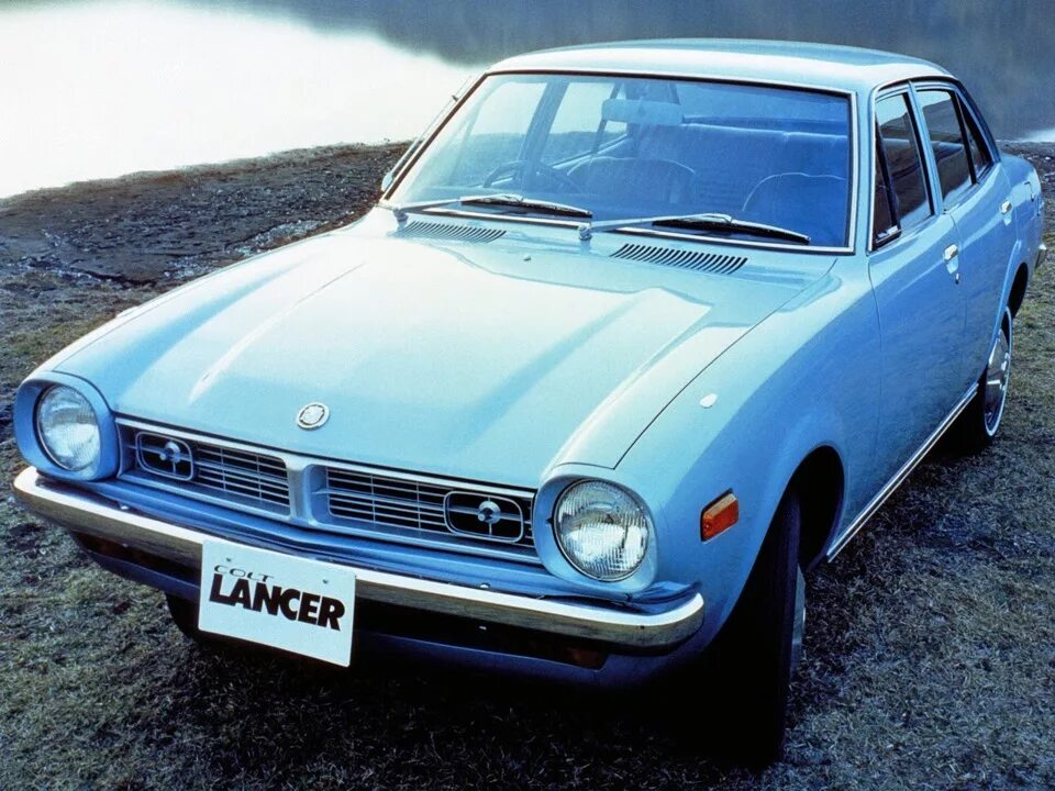 Митсубиси первого поколения. Mitsubishi Lancer 1 поколение. Митсубиси Лансер 1 поколения. Mitsubishi Lancer 1973. Mitsubishi Lancer (a70).
