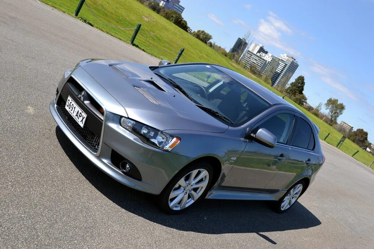 Mitsubishi lancer 2012. Мицубиси Лансер 2012. Мицубиси Лансер 10 2012. Mitsubishi Lancer x 2012. Мицубиси ланцер 2012.