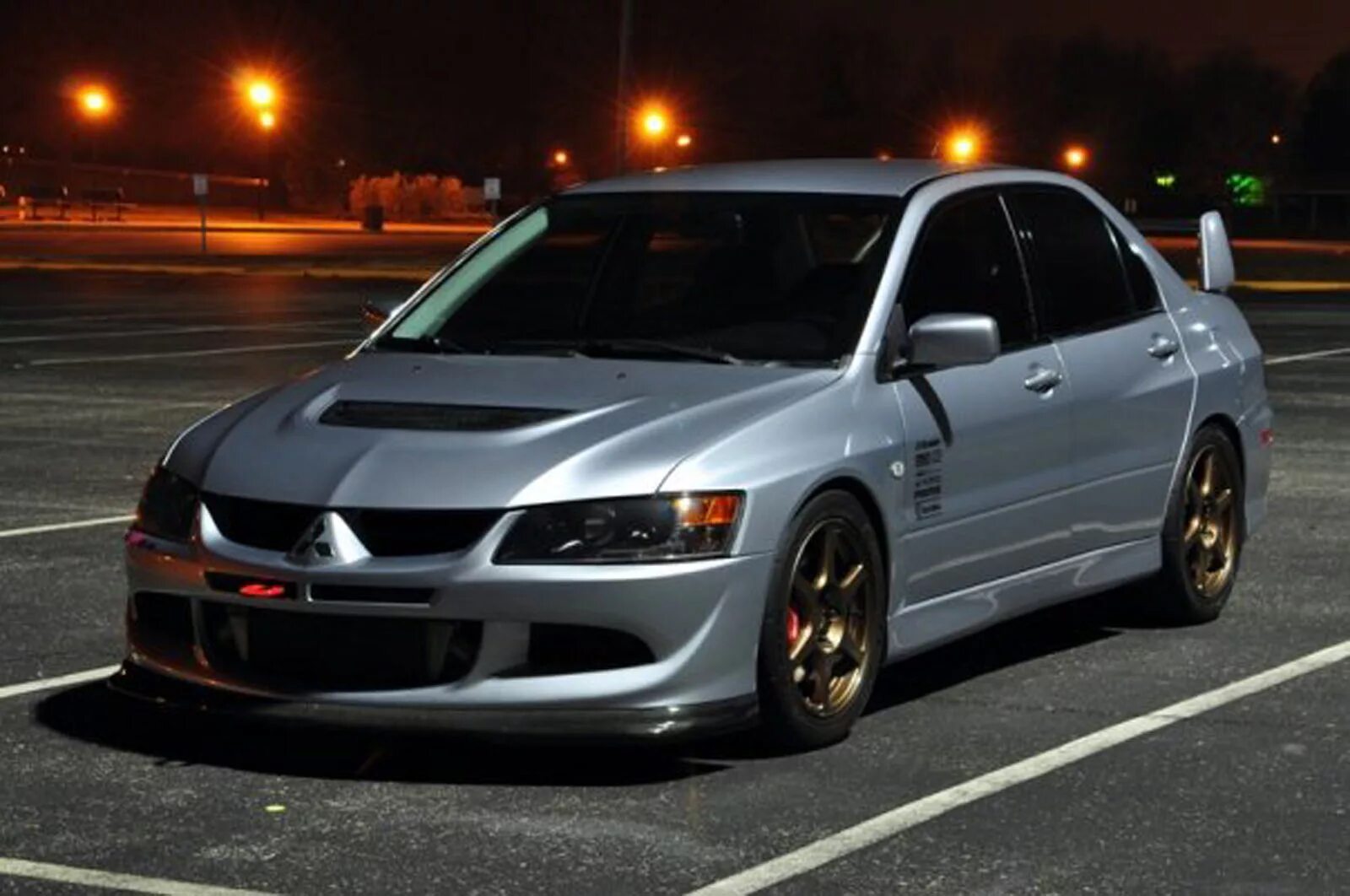 Эво фото. Митсубиси лансер эво. митсубиси лансер революшн. mitsubishi lancer evolution 2003. мицубиси лансер эволюшн 9.