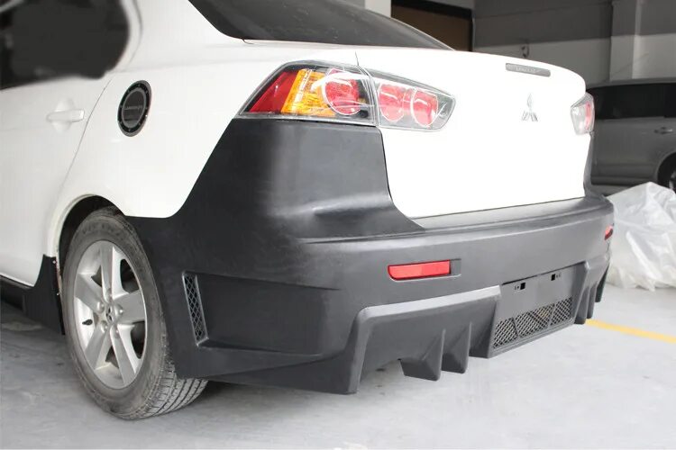 бампер лансер 10 эво стиль. задний бампер мицубиси лансер. накладка на задний бампер mitsubishi lancer 10. эво накладка лансер 10. задний диффузор лансер 10 эво.