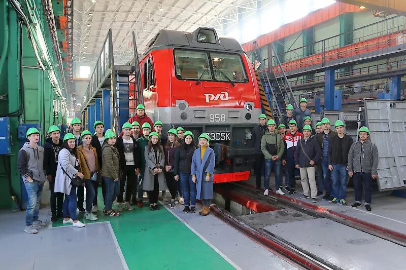 Сайт нэвза новочеркасск. Электровозостроительный завод Новочеркасск. НЭВЗ Новочеркасск. НЭВЗ электротех. ООО ПК НЭВЗ.