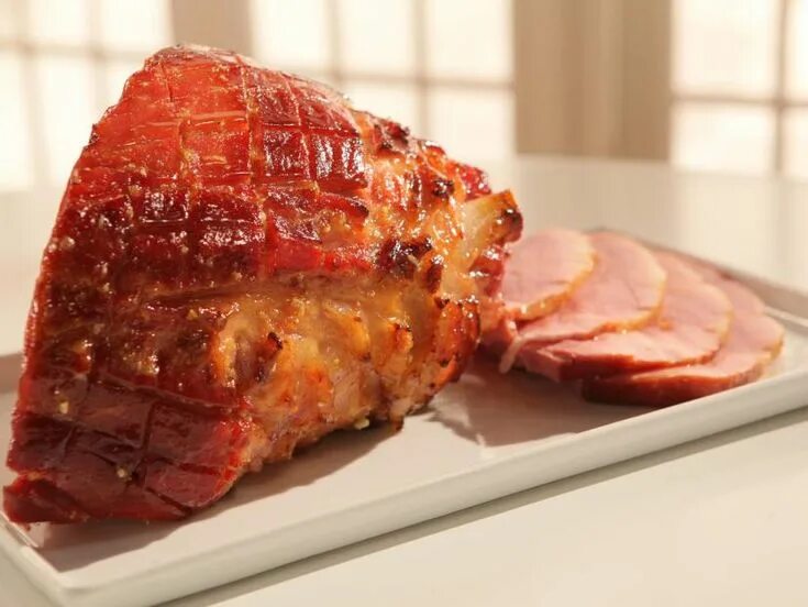 Glazed Baked Ham Recipe SimplyRecipes.com-A big baked ham is one of the easiest 