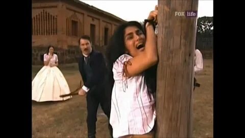 Избивает рабыню