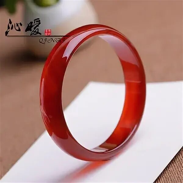 Кольцо на прозрачном. Черное кольцо. Кольцо из керамики с красным камнем. Кольцо карбид вольфрама красное. Размер красного кольца.