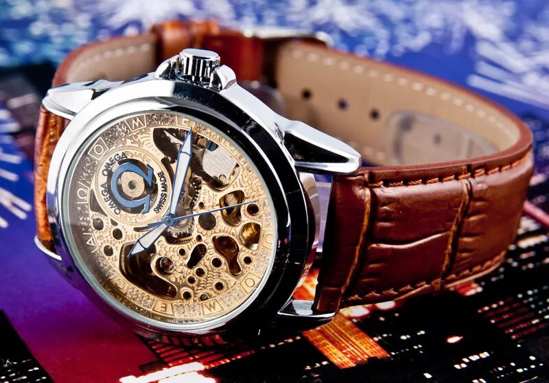 Часы недорого екатеринбург. Механические часы Омега. Часы Омега скелетон оригинал. Швейцарские часы. Часы наручные Omega.